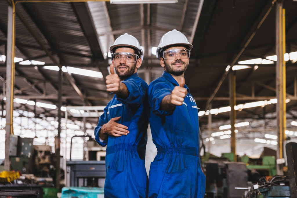 two electricians smiling
